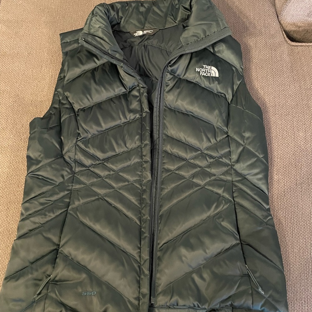 The North Face down vest. Size Medium. Like new condition.